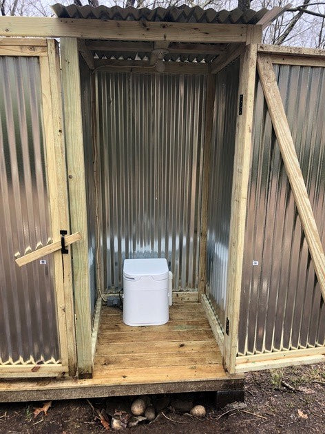 OGO ORIGIN compost toilet in a sustainable off-grid bathroom